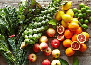 a group of fruits and vegetables on a wood surface Healthy Weight Loss Diets Bedfordshire